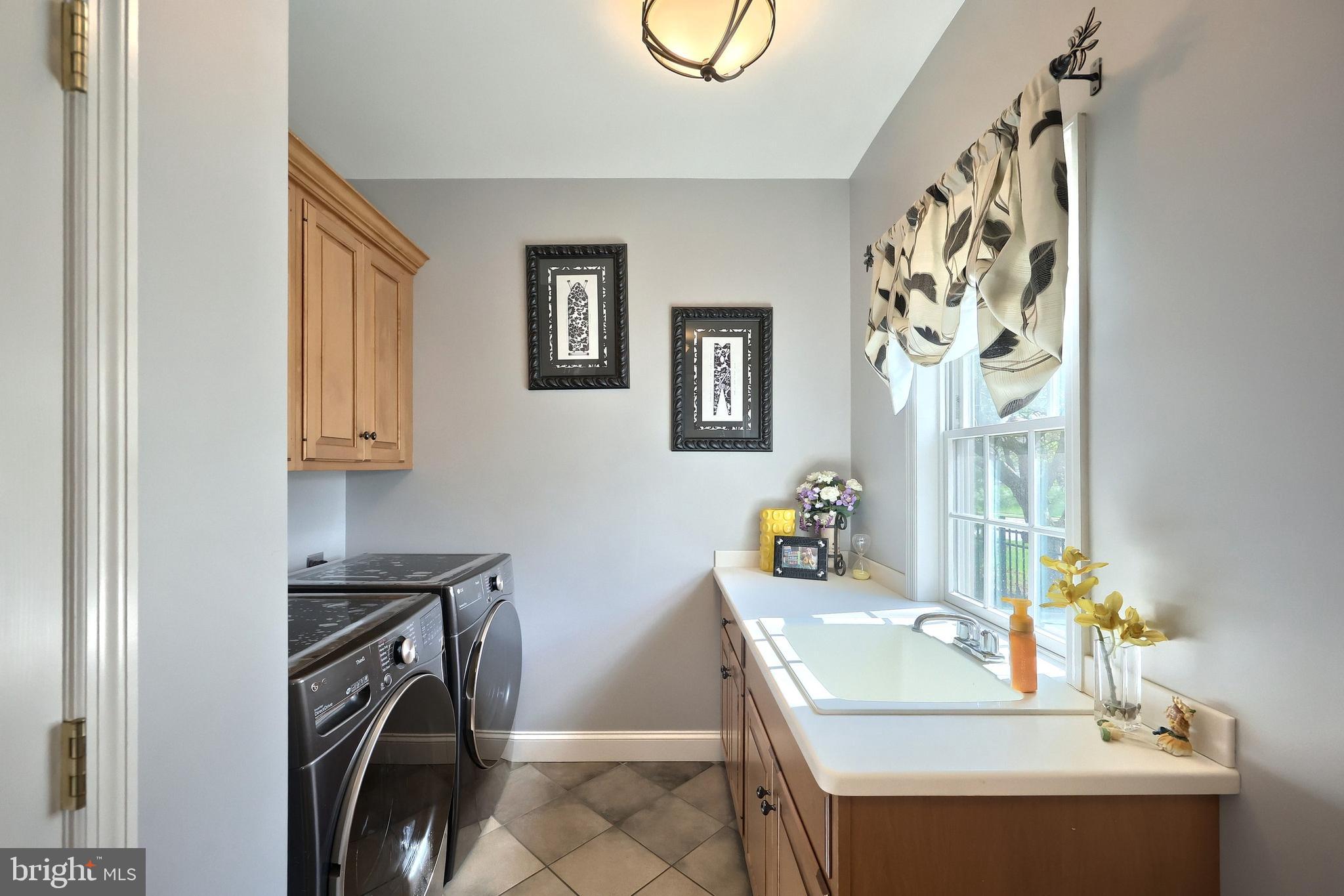 2119 Bernays Drive York, PA 17404 - Photo 38 of 72 a bathroom with a sink a vanity and a mirror