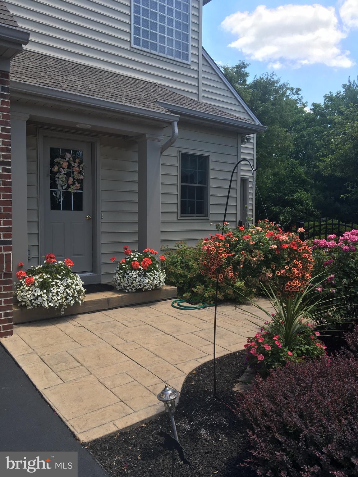 2119 Bernays Drive York, PA 17404 - Photo 67 of 72 a view of a house that has a lot of flower plants