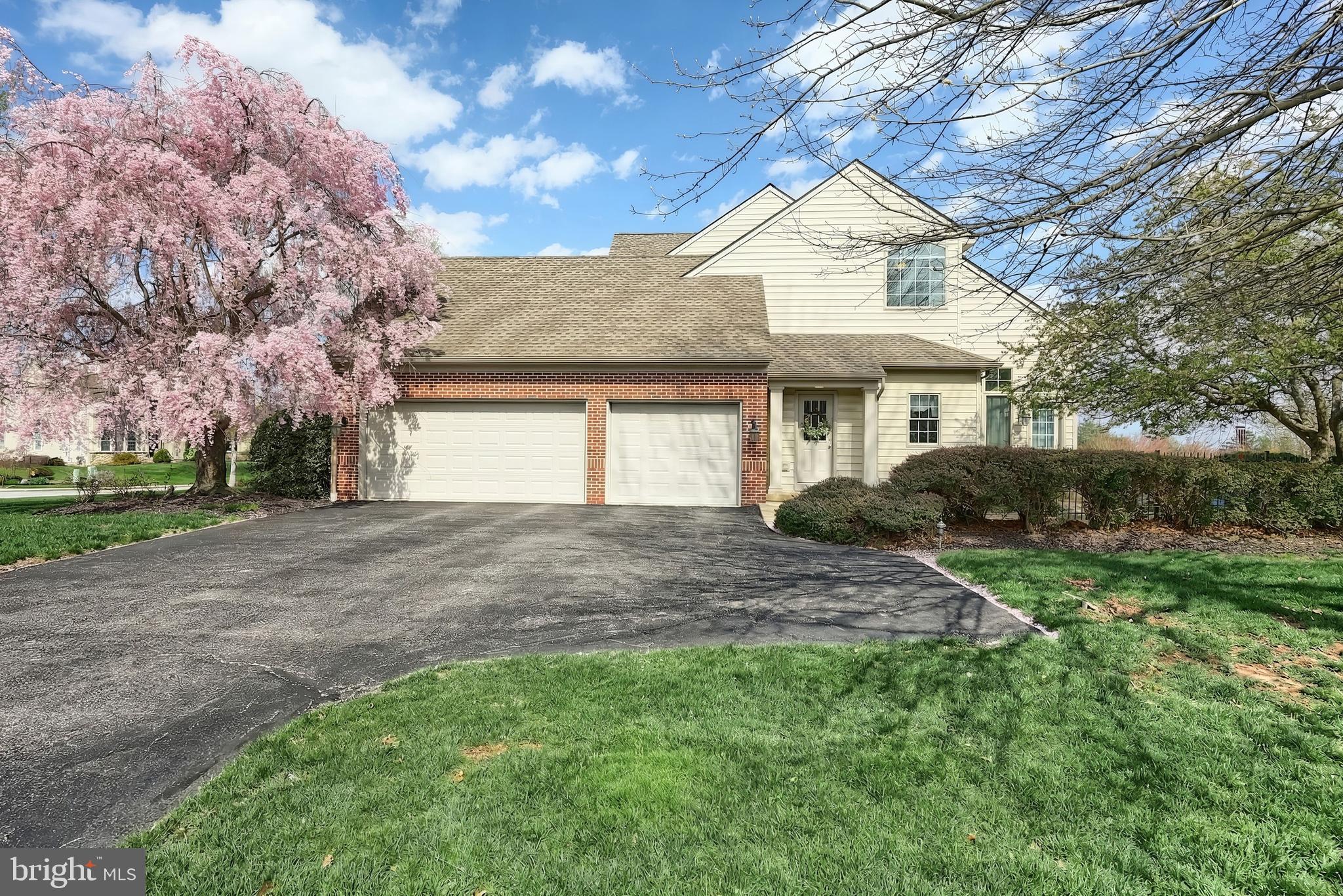 2119 Bernays Drive York, PA 17404 - Photo 10 of 72 a front view of a house with a garden