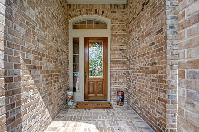 a view of a brick house with a door