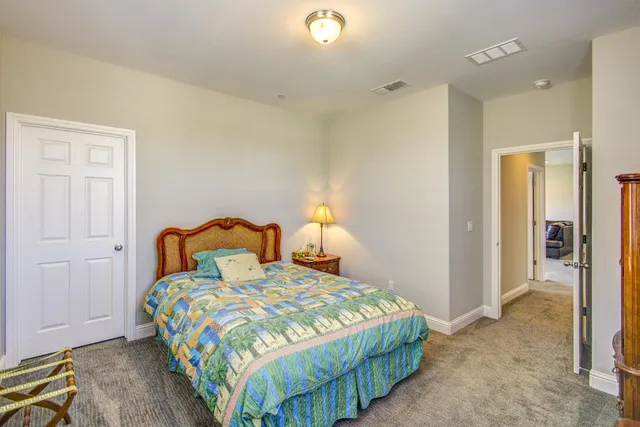 a bathroom with a double vanity sink a and a mirror