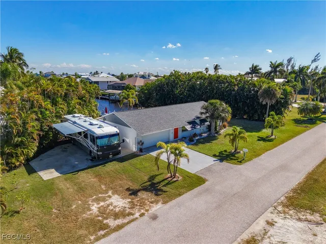 an aerial view of a house with a garden