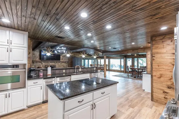a kitchen with granite countertop lots of counter top space