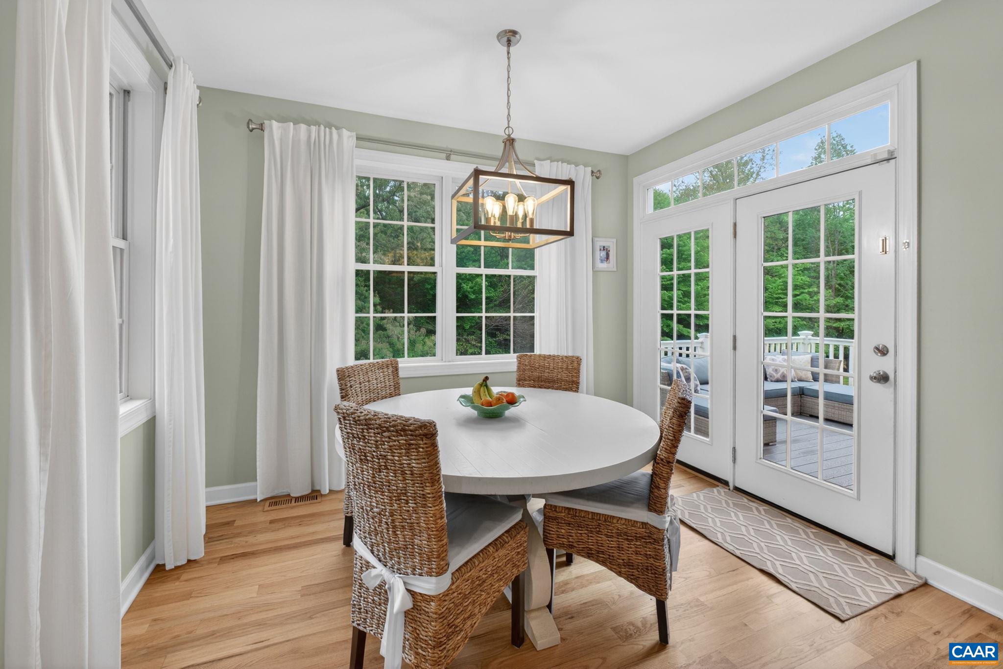 511 Taylor Ridge Way Palmyra, VA 22963 - Photo 15 of 57 a view of a dining room with furniture window and outside view