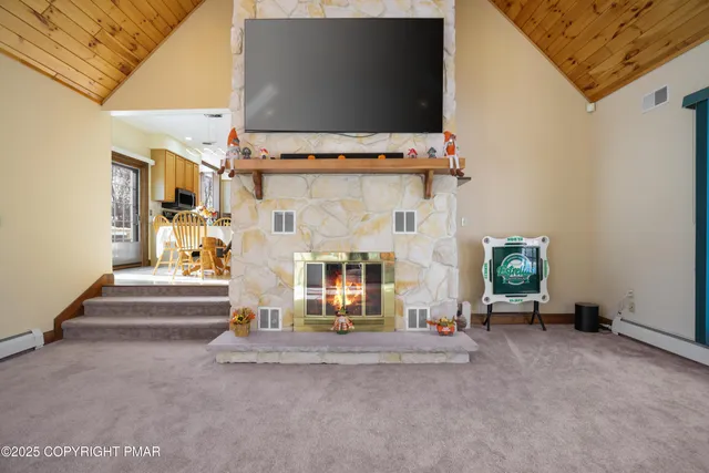 a spacious bedroom with a bed and a window