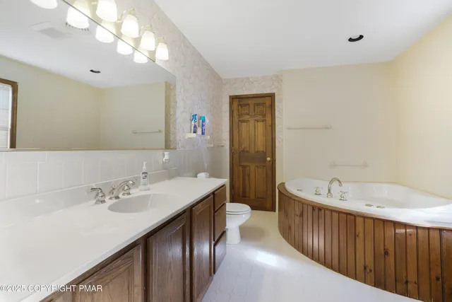 a view of a hallway view with staircase