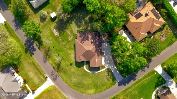 an aerial view of a swimming pool