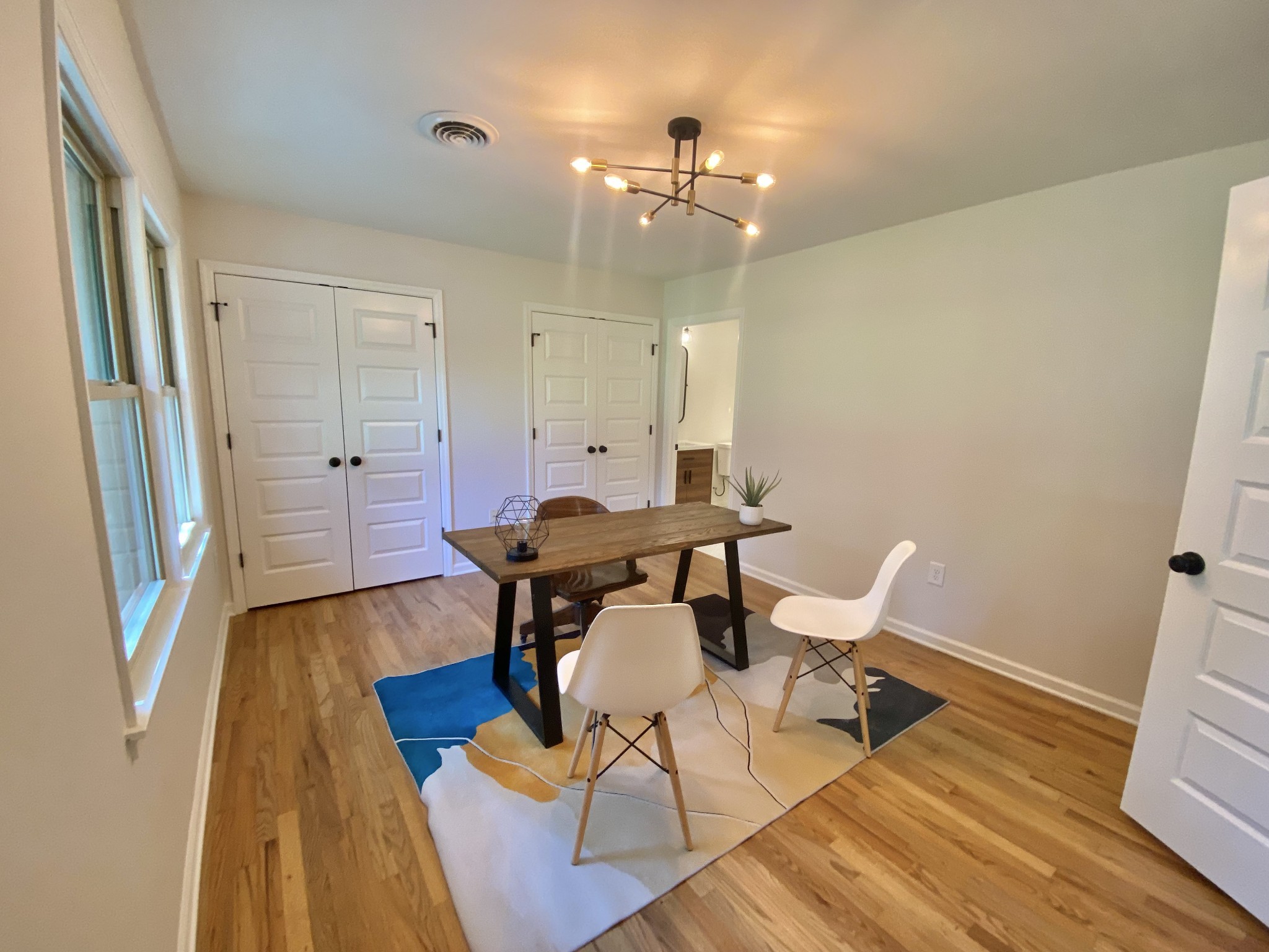 218 Windmill Drive Lebanon, TN 37087 - Photo 15 of 70 a view of a dining room with furniture and wooden floor