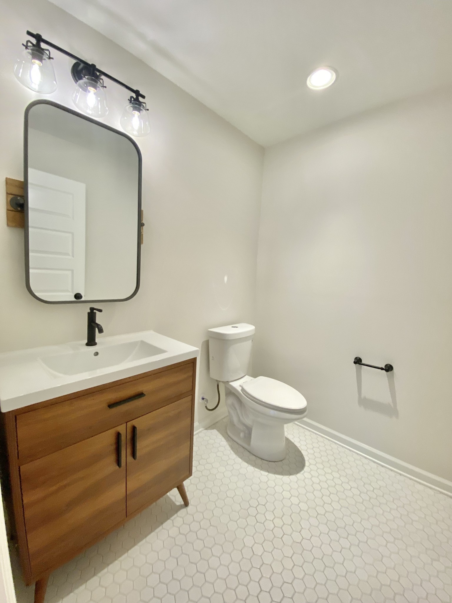218 Windmill Drive Lebanon, TN 37087 - Photo 17 of 70 a bathroom with a toilet sink and mirror