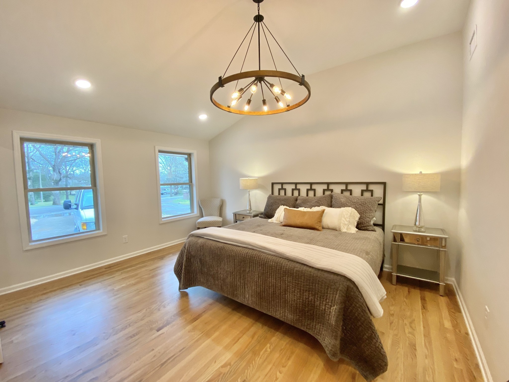 218 Windmill Drive Lebanon, TN 37087 - Photo 42 of 70 a bed room with a bed mirror and a window