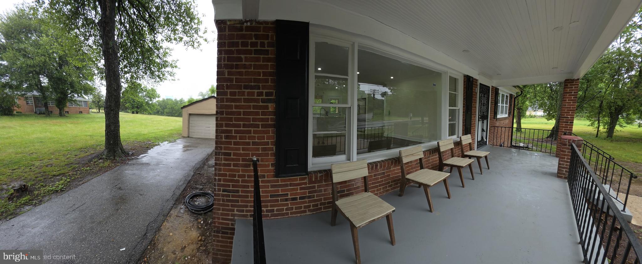2206 Brinkley Road Fort Washington, MD 20744 - Photo 16 of 78 a view of a patio with chairs and table in the patio