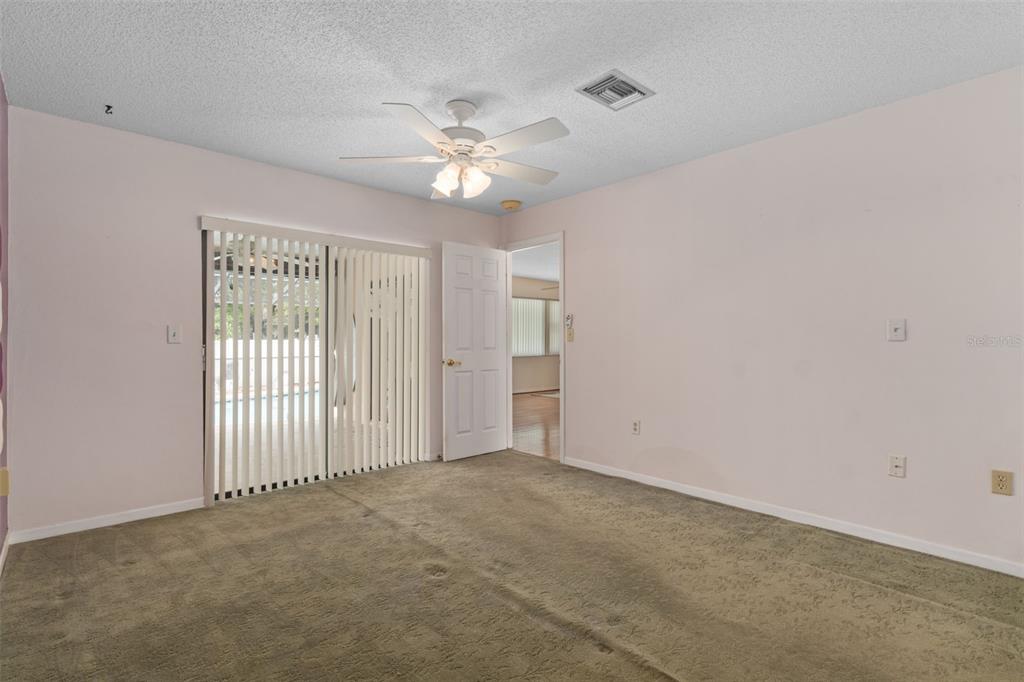 3217 Abeline Road Spring Hill, FL 34608 - Photo 24 of 48 a view of an empty room with a window