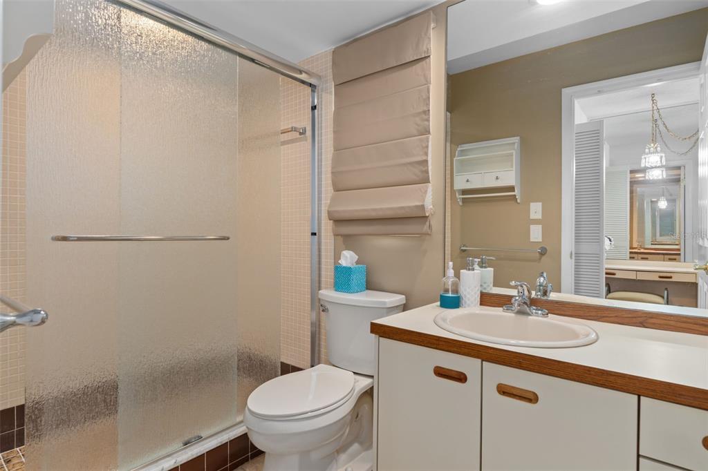 3217 Abeline Road Spring Hill, FL 34608 - Photo 26 of 48 a bathroom with a sink toilet and shower