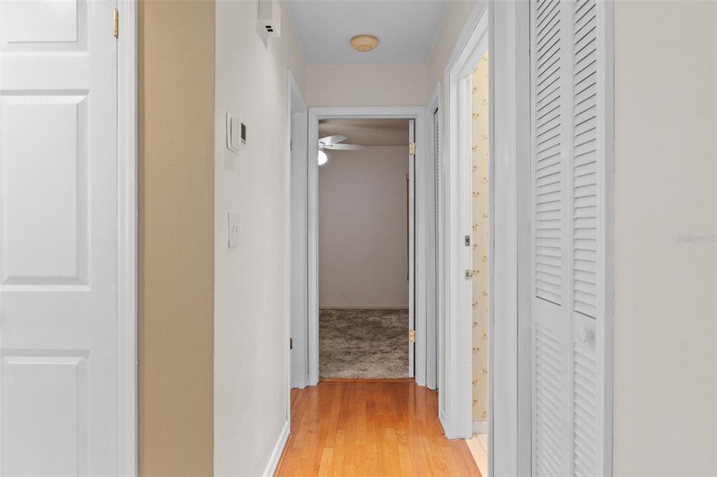 3217 Abeline Road Spring Hill, FL 34608 - Photo 27 of 48 a view of a bathroom from a hallway