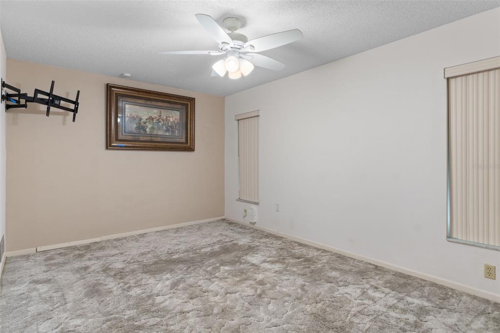 3217 Abeline Road Spring Hill, FL 34608 - Photo 28 of 48 a view of a room with a fan