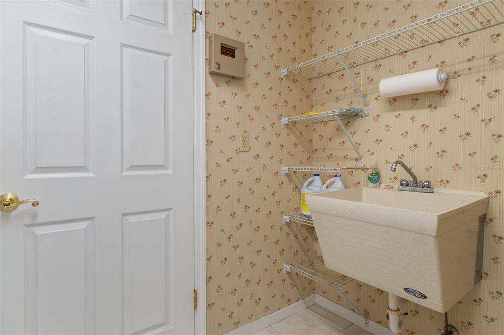 3217 Abeline Road Spring Hill, FL 34608 - Photo 33 of 48 a bathroom with a sink a toilet and shower