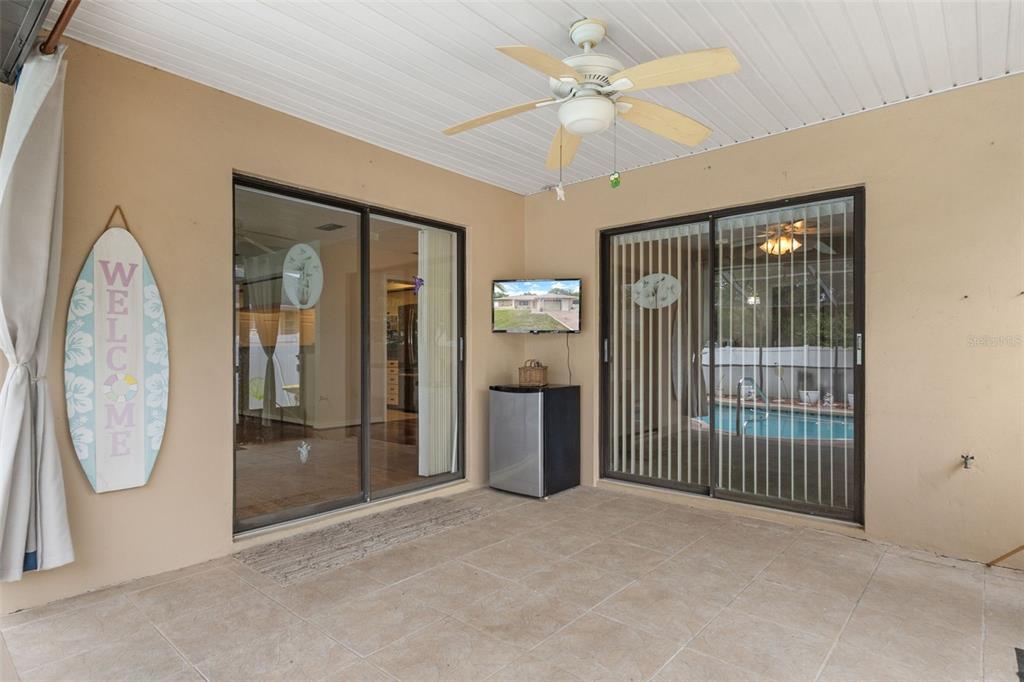 3217 Abeline Road Spring Hill, FL 34608 - Photo 41 of 48 an empty room with windows and fan