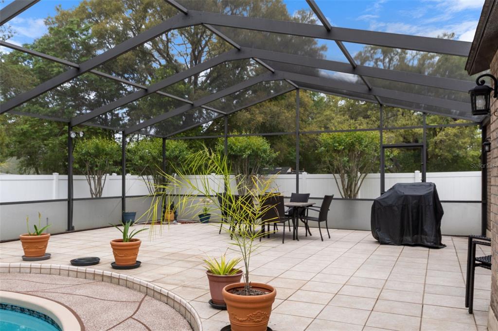 3217 Abeline Road Spring Hill, FL 34608 - Photo 45 of 48 a view of outdoor dining space with a patio