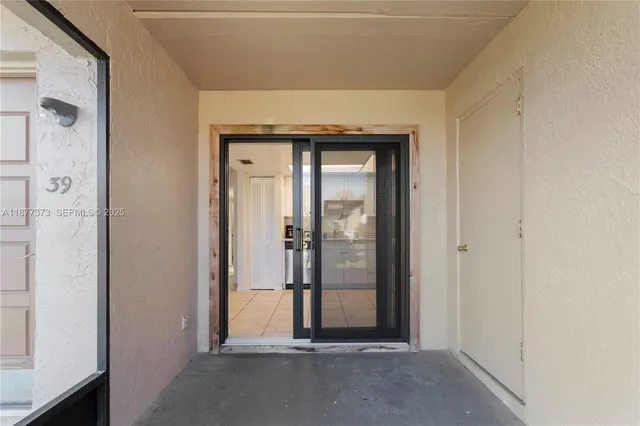 a view of a front door and outdoor space