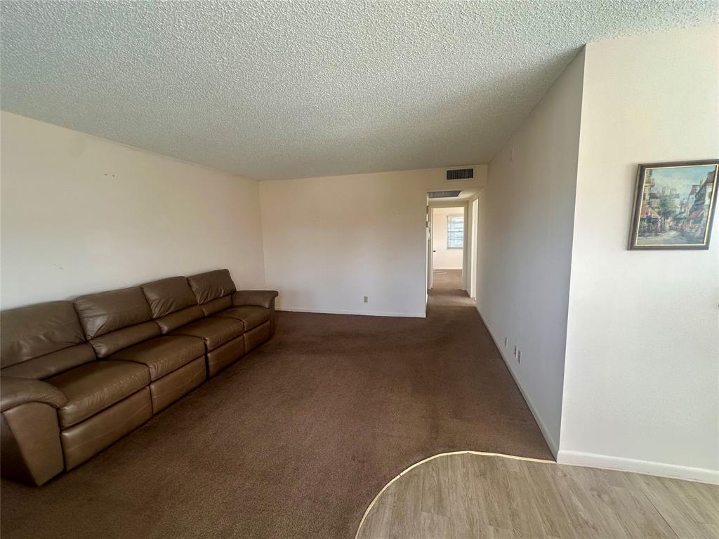 29 Preston A Boca Raton, FL 33434 - Photo 10 of 21 a living room with furniture and window