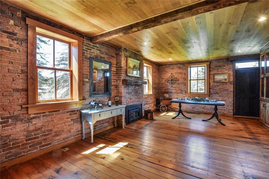 394 Game Farm Road New Castle, PA 16101 - Photo 6 of 25 The dining room is spacious enough to entertain a large family and friends. Custom built-in lighted cabinets with glass doors will hold all of your tableware and collectables. Cozy gas fireplace for cool PA days.