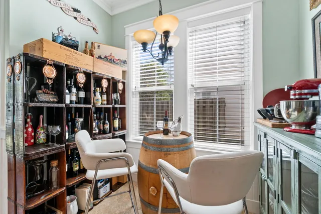 a kitchen with stainless steel appliances granite countertop a refrigerator stove microwave and sink