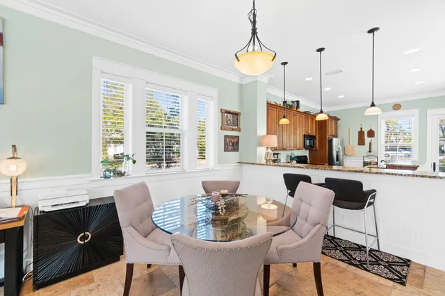 a living room with furniture and a piano