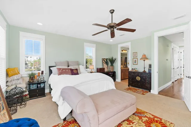 a bedroom with a bed furniture and window