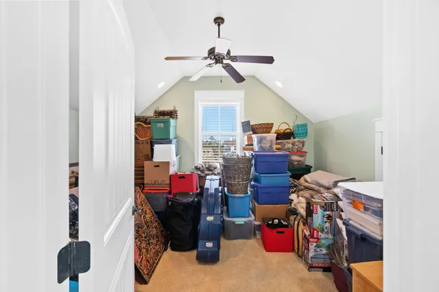 a bedroom with a bed and furniture