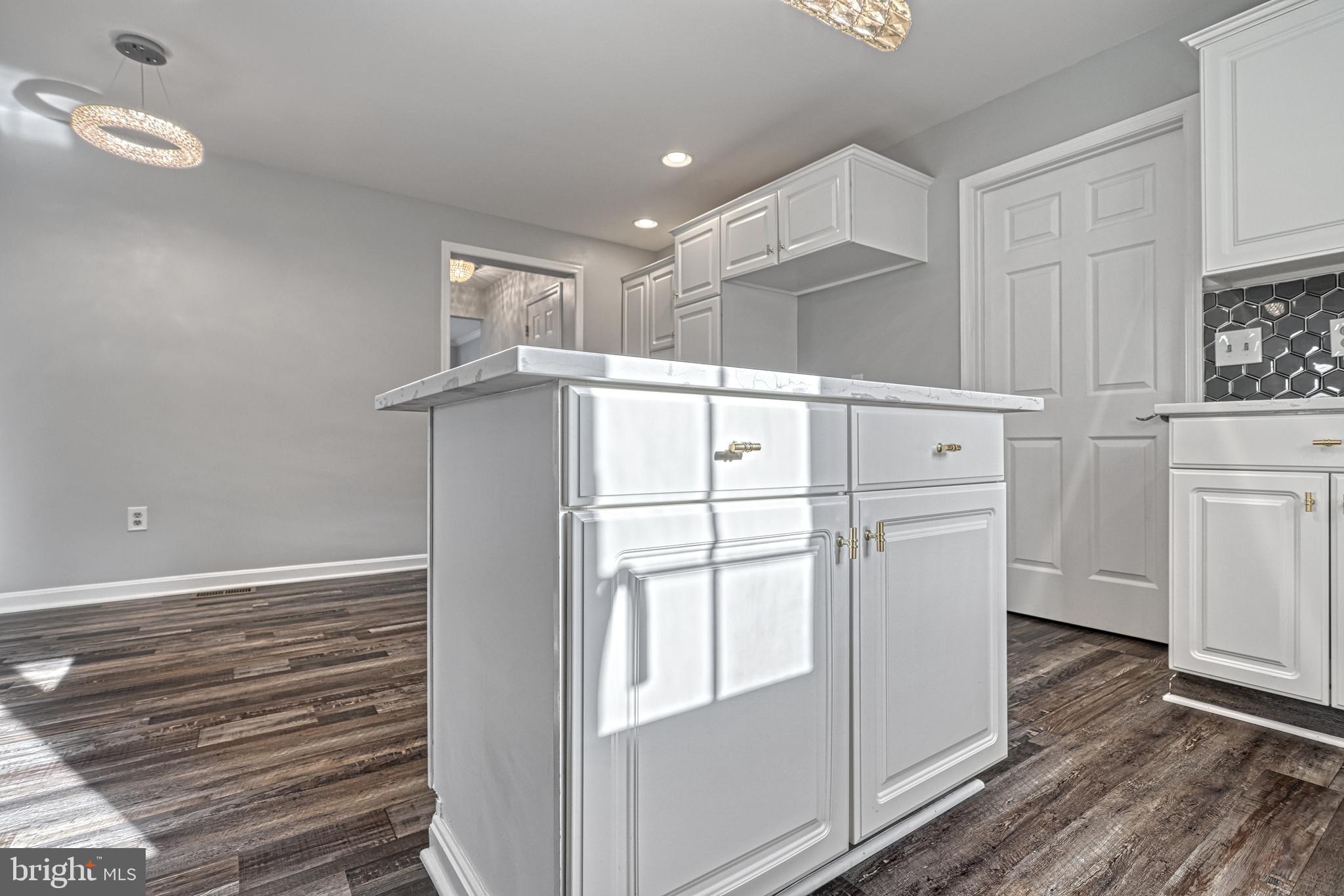 14 Kratz Road Shrewsbury, PA 17361 - Photo 45 of 137 a kitchen with white cabinets and white appliances