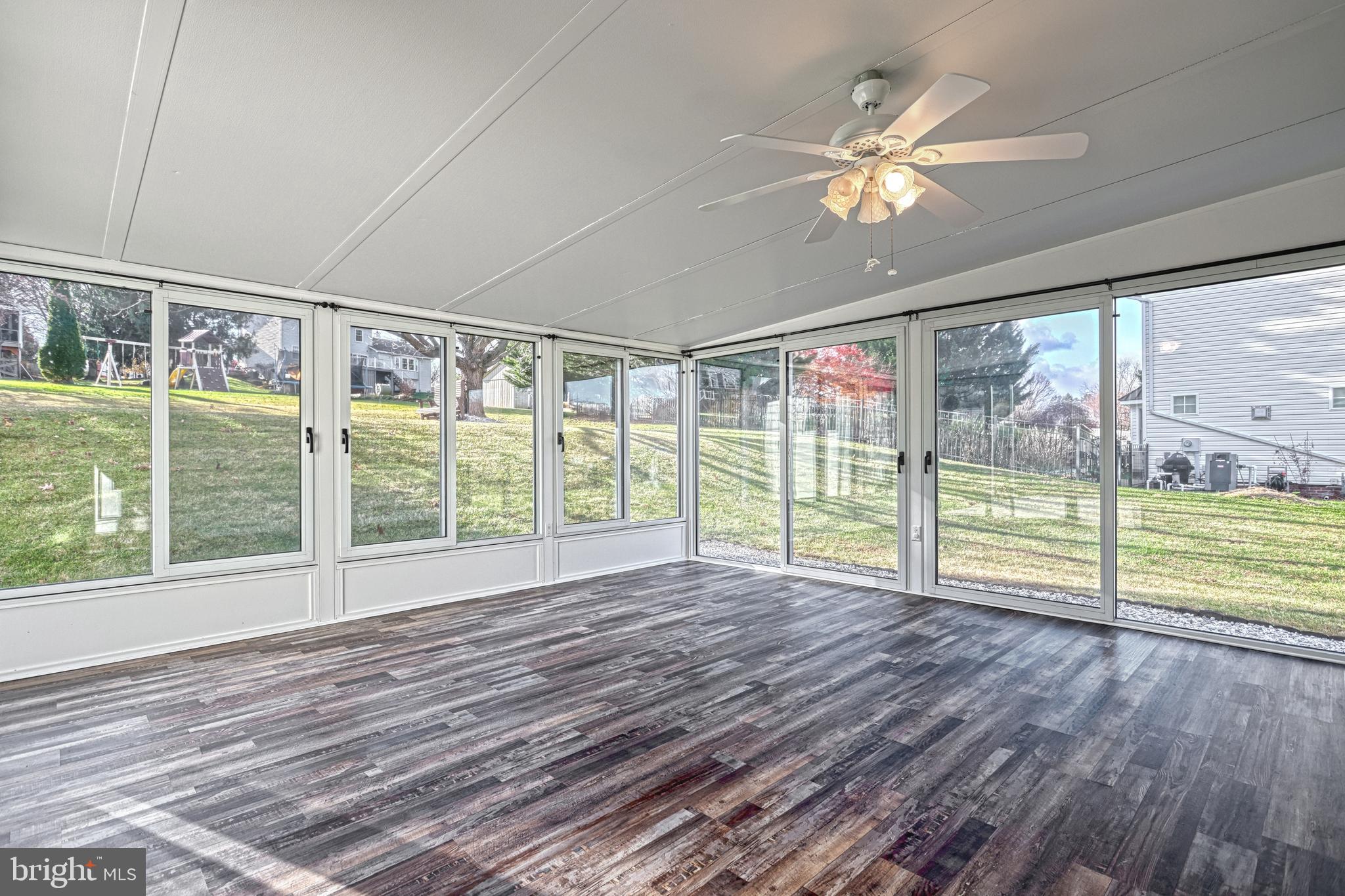 14 Kratz Road Shrewsbury, PA 17361 - Photo 46 of 137 a view of an empty room with wooden floor and a large window