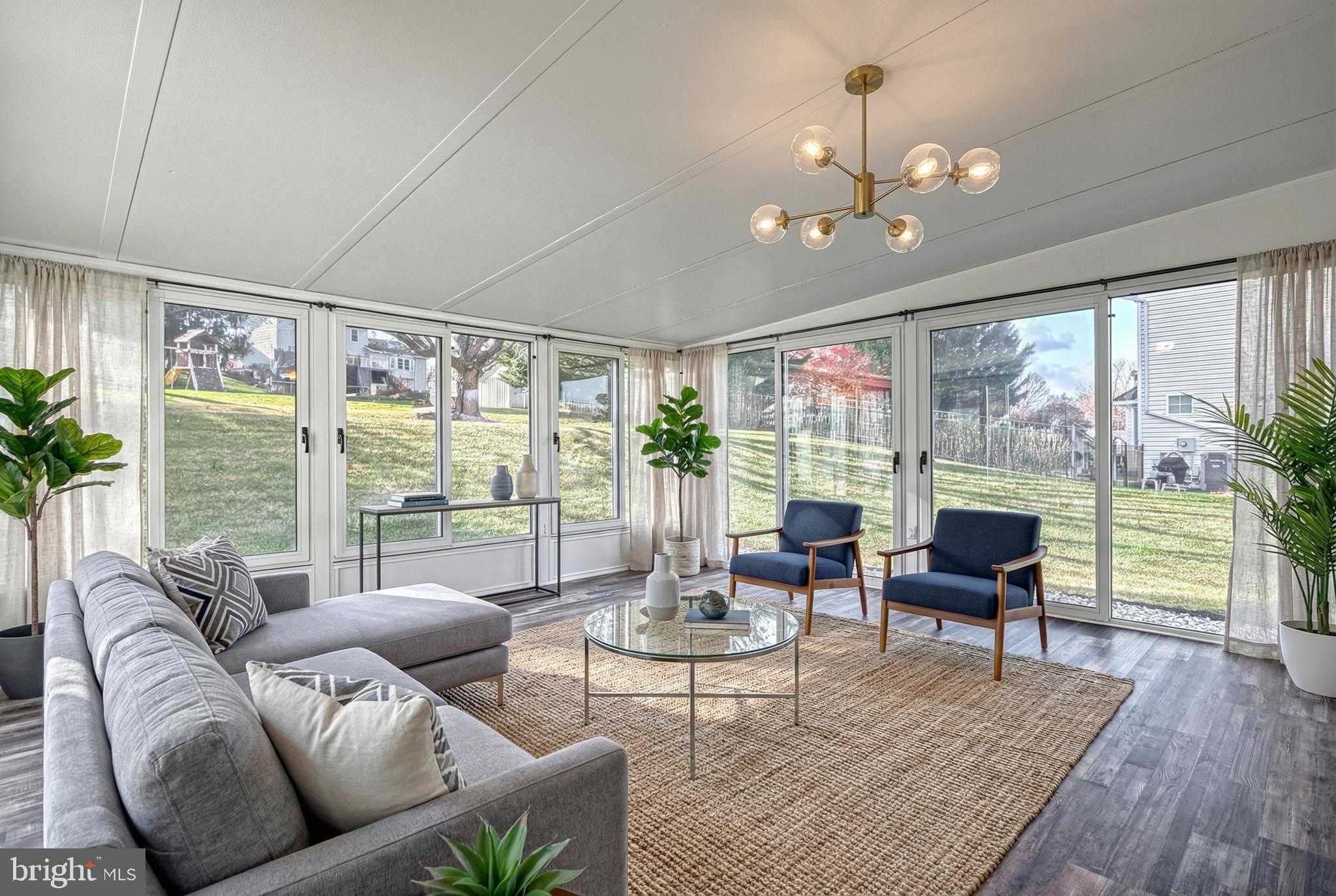 14 Kratz Road Shrewsbury, PA 17361 - Photo 47 of 137 a living room with furniture large windows and wooden floor
