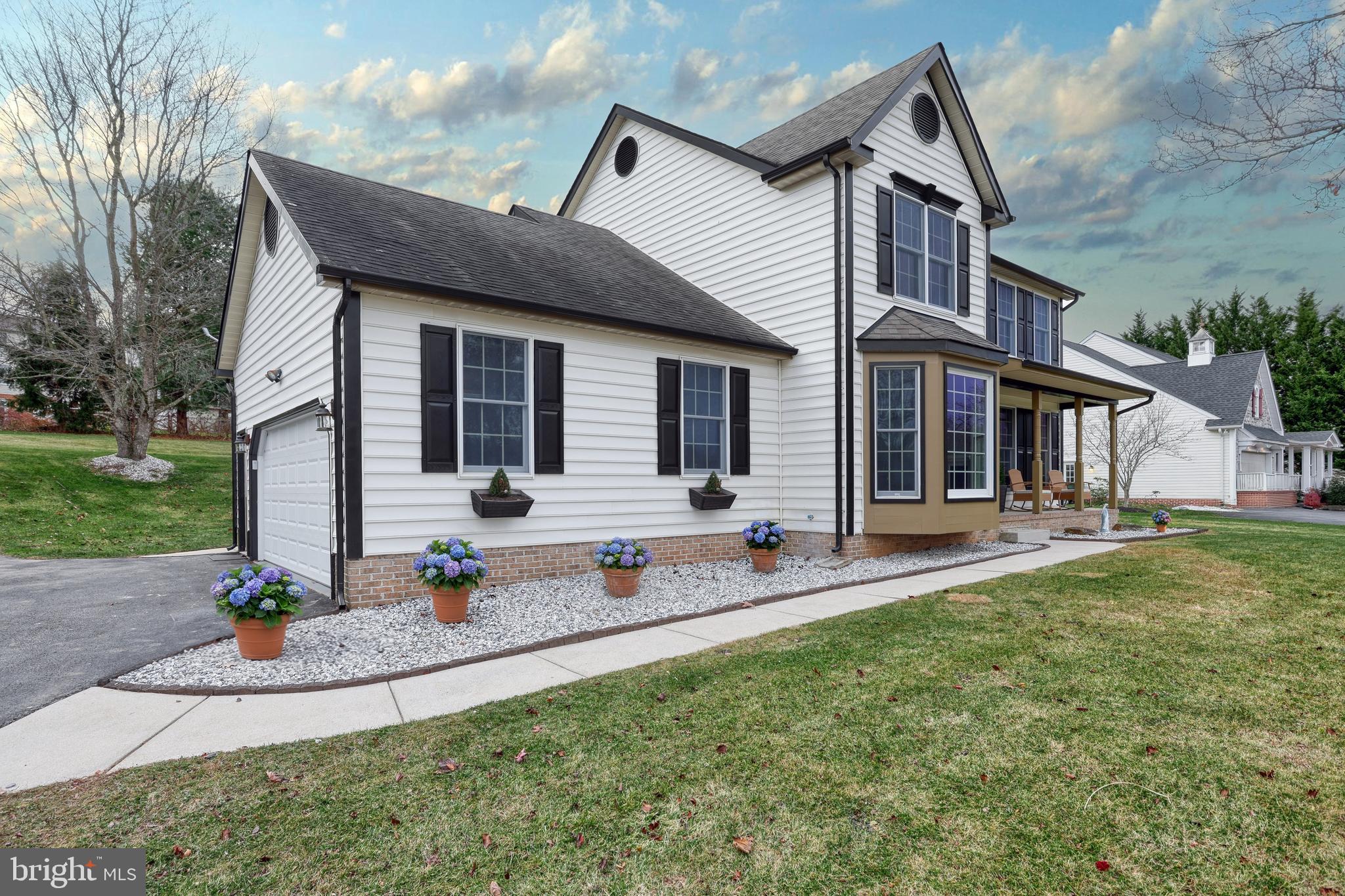 14 Kratz Road Shrewsbury, PA 17361 - Photo 6 of 137 a view of a house with backyard sitting area and garden