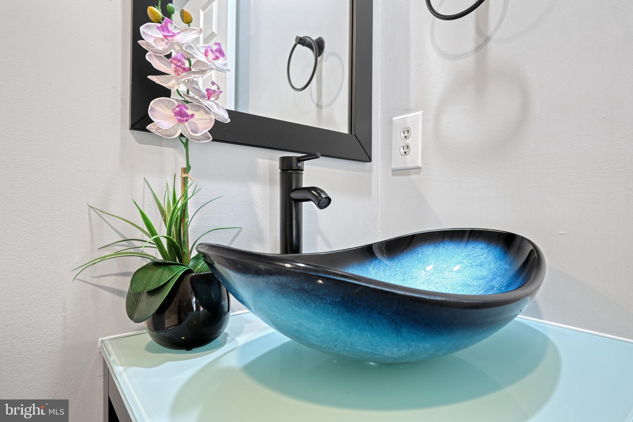 14 Kratz Road Shrewsbury, PA 17361 - Photo 70 of 137 a view of a vase with flowers on a dining table