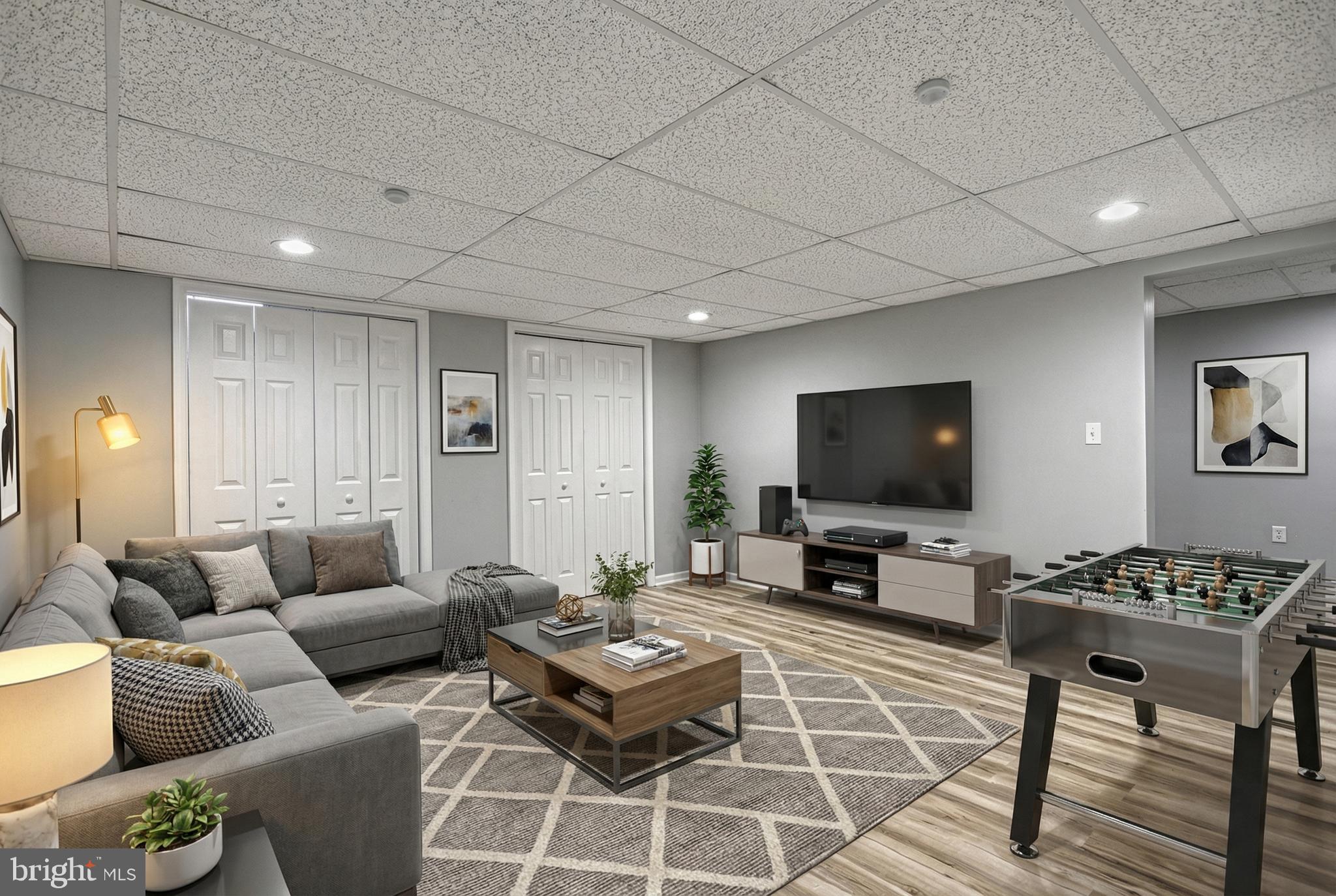 14 Kratz Road Shrewsbury, PA 17361 - Photo 94 of 137 a living room with furniture a flat screen tv and a refrigerator