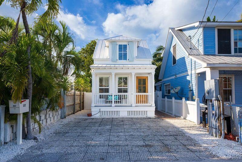 317 Virginia Street Key West, FL 33040 - Photo 46 of 47 a front view of a house with a porch
