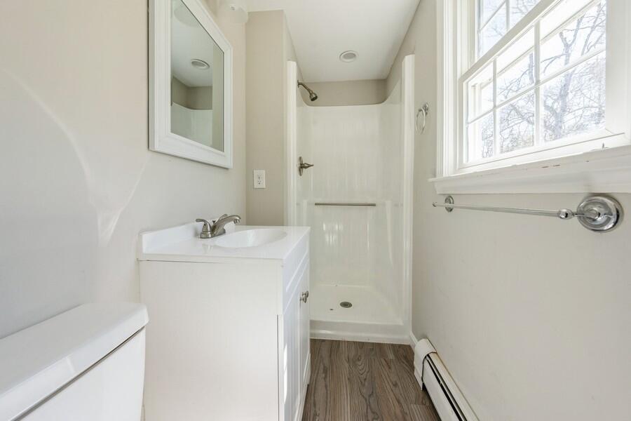 51 Carrie Lee's Way Centerville, MA 02632 - Photo 13 of 15 a bathroom with a sink and a mirror