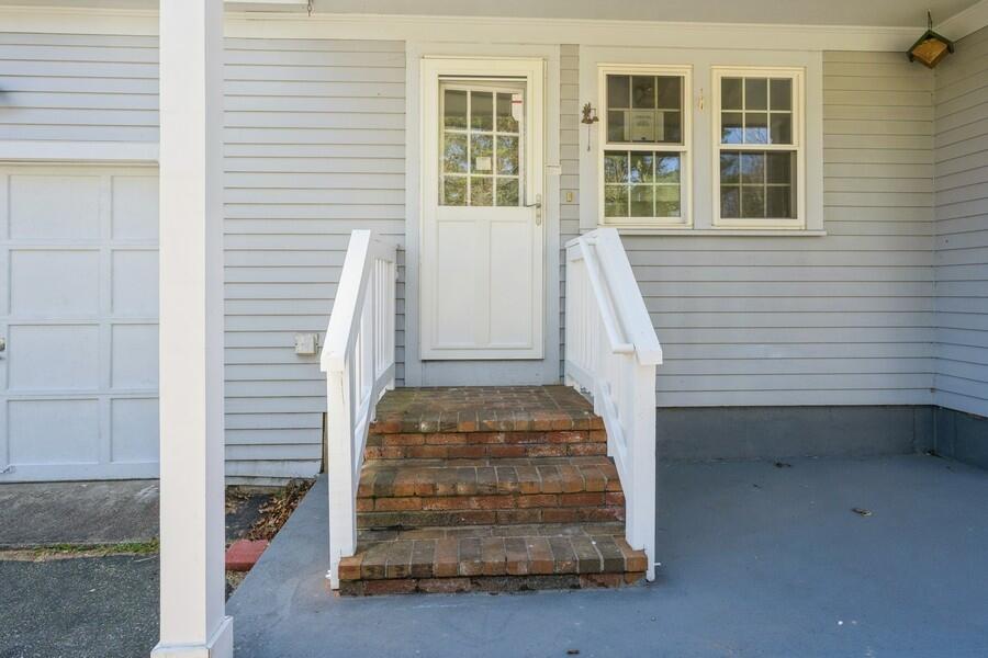 51 Carrie Lee's Way Centerville, MA 02632 - Photo 2 of 15 a view of entryway with white walls and windows