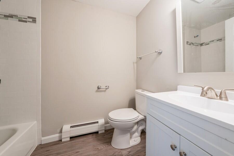 51 Carrie Lee's Way Centerville, MA 02632 - Photo 9 of 15 a bathroom with a toilet a sink and bathtub