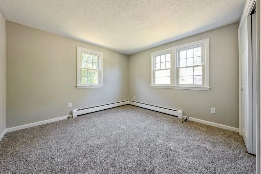 51 Carrie Lee's Way Centerville, MA 02632 - Photo 10 of 15 an empty room with windows
