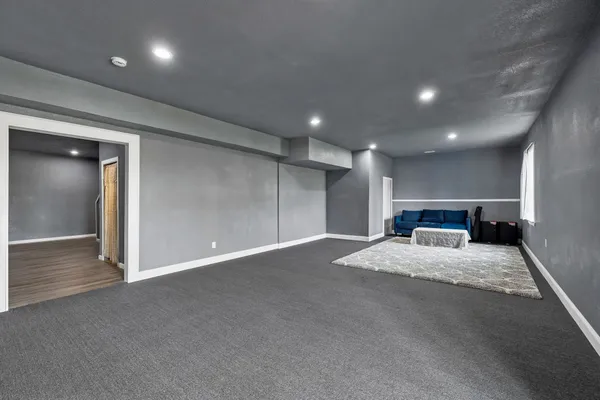 a bedroom with a bed and a closet