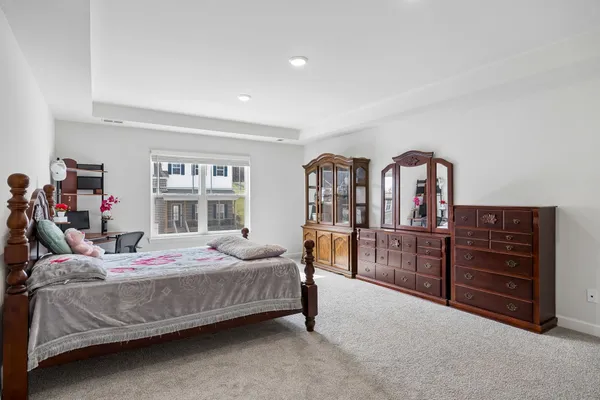 a bathroom with a sink toilet and a mirror