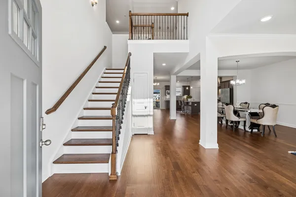 a view of entryway with wooden floor
