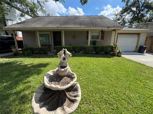 a view of balcony with wooden floor