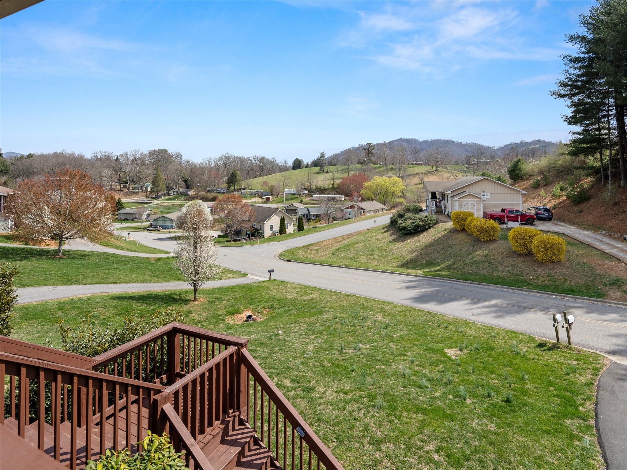 150 Barefoot Ridge Clyde, NC 28721 - Photo 12 of 27 a view of a balcony with yard