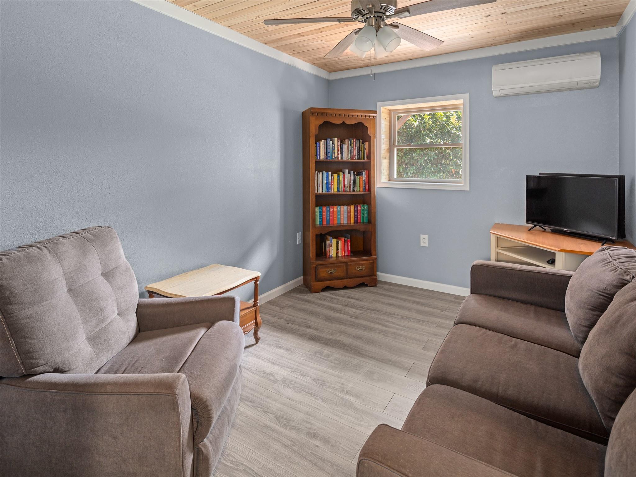 150 Barefoot Ridge Clyde, NC 28721 - Photo 20 of 27 a living room with furniture and a flat screen tv