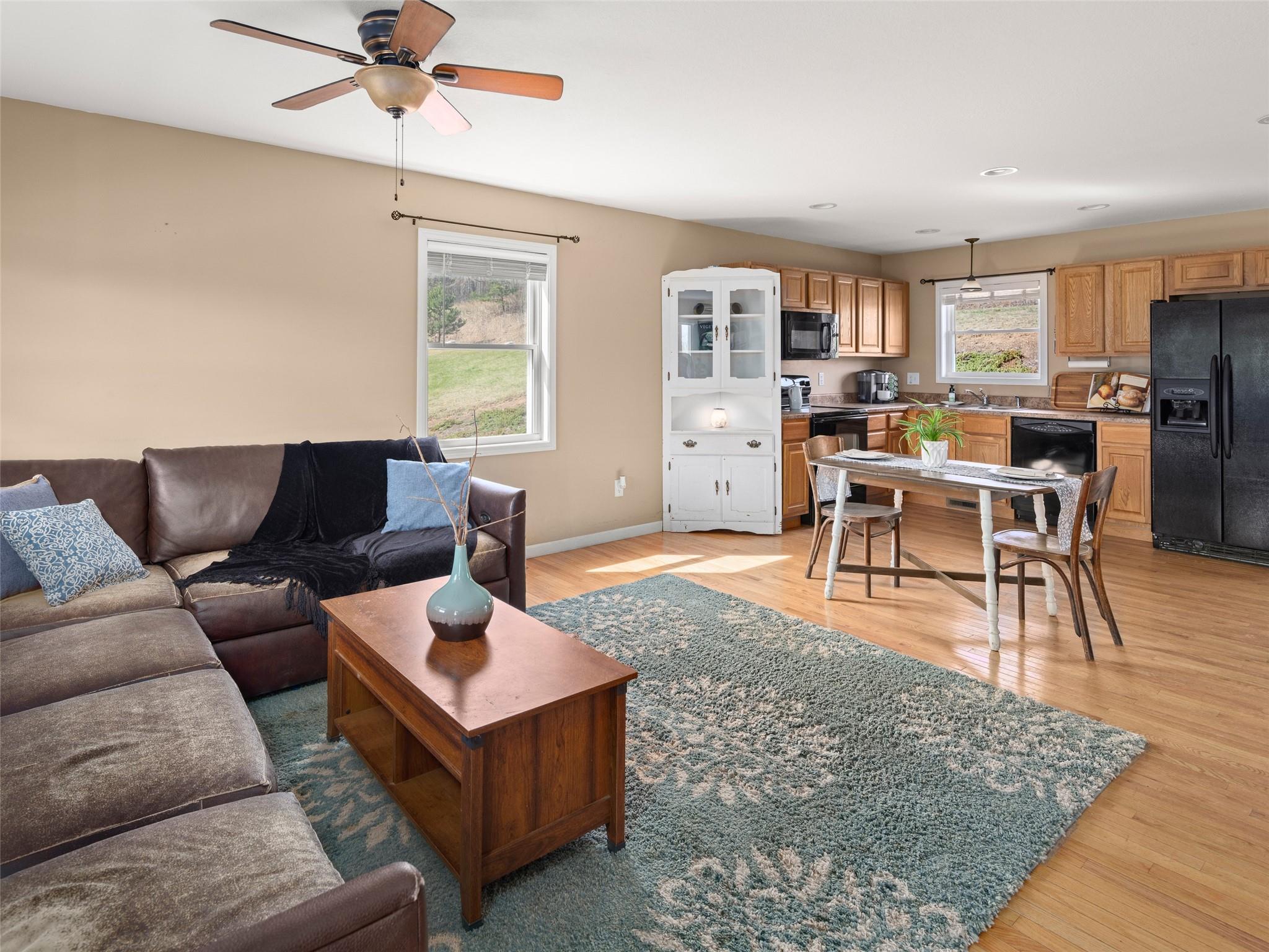 150 Barefoot Ridge Clyde, NC 28721 - Photo 2 of 27 a living room with furniture wooden floor and a window