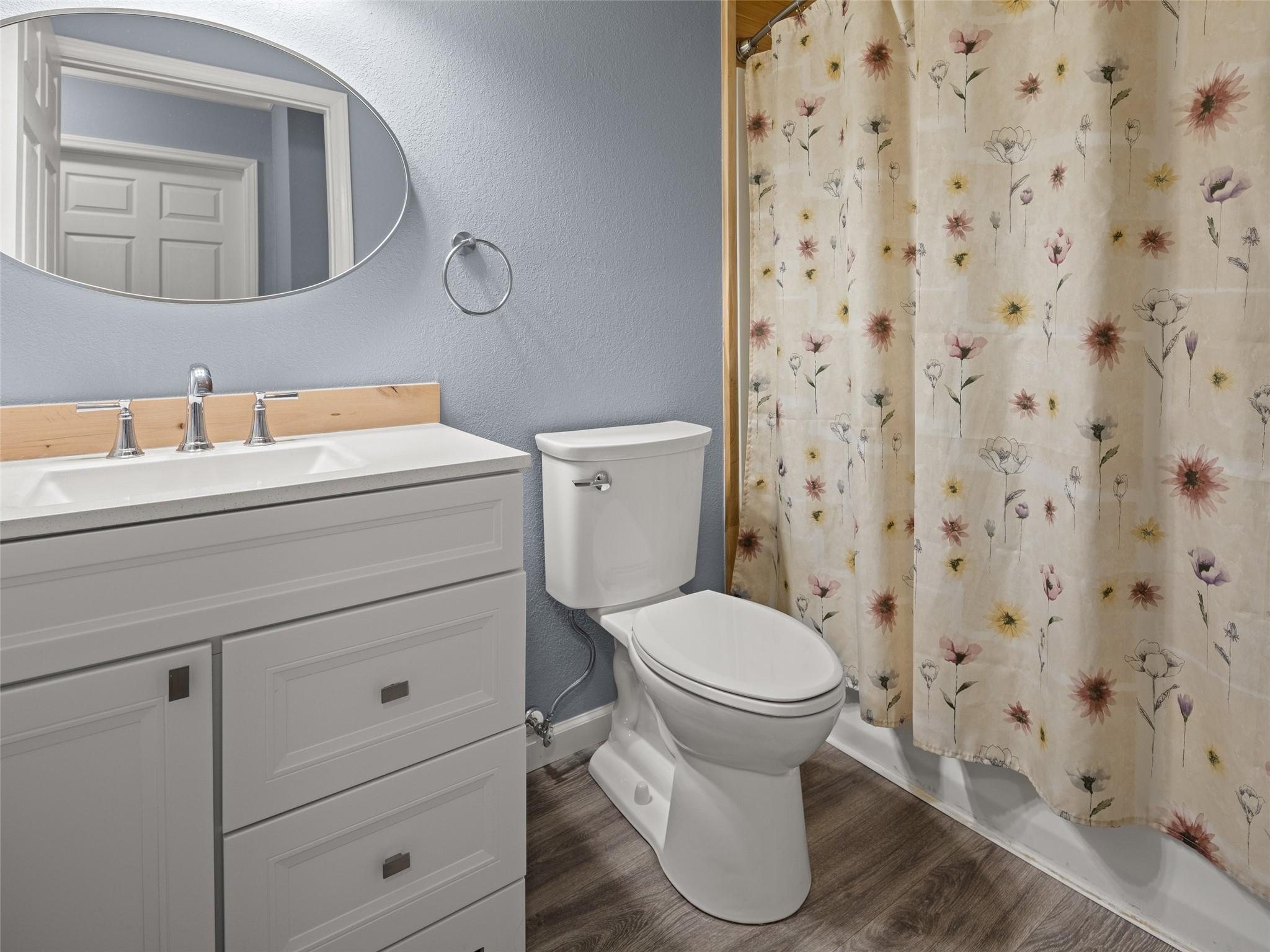 150 Barefoot Ridge Clyde, NC 28721 - Photo 21 of 27 a bathroom with a sink and a toilet
