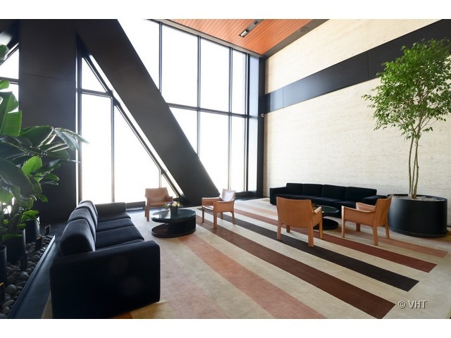 175 East Delaware Place, Unit 4522 Chicago, IL 60611 - Photo 2 of 15 a living room with furniture