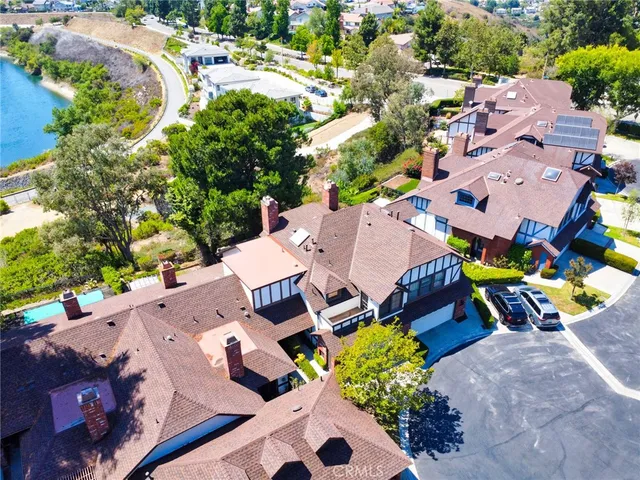 an aerial view of a house with a garden
